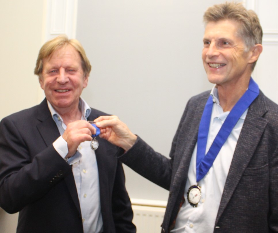 Stephen presents Past Chairman's badge to Mark